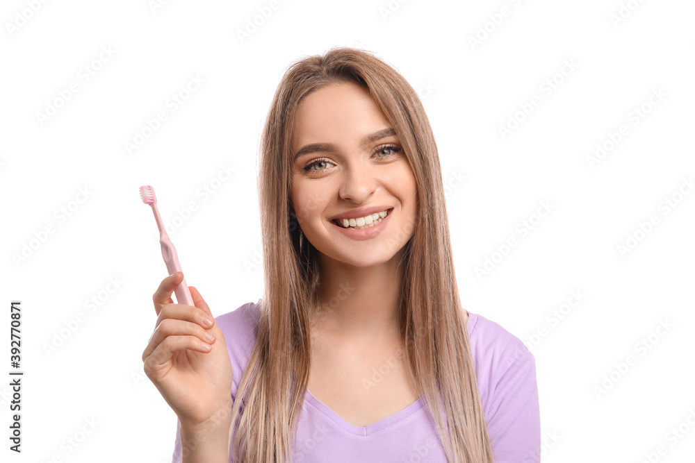 Young woman with tooth brush on white background Young woman with tooth brush on white background