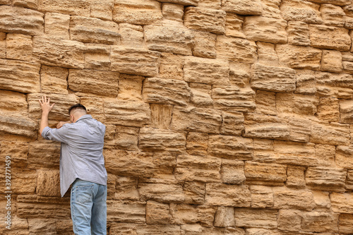 Man praying near the Wailing Wall