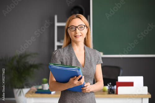 Mature female teacher in cl...