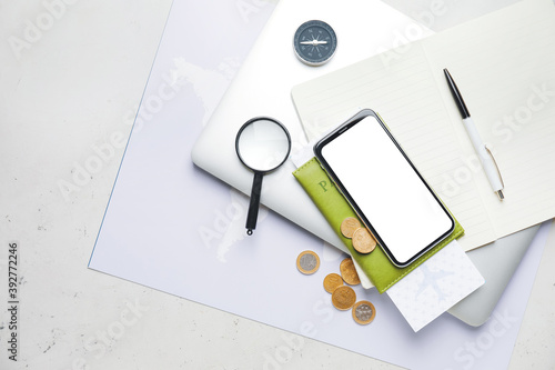 Set of travel items on ligh...