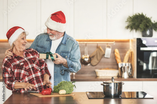 Husband gives his wife christmas present