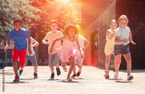 Activity children compete in the summer city street