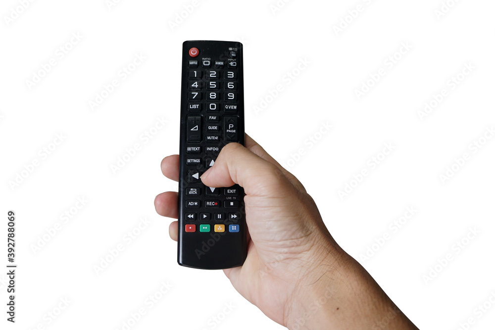 Hand holding the remote TV, finger pressing the button of the remote control, isolated on white background.