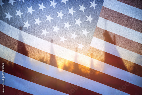Sunlight shining through of an American flag in the morning. Closeup.  