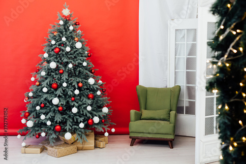 New Year's card interior red decor and Christmas tree with gifts