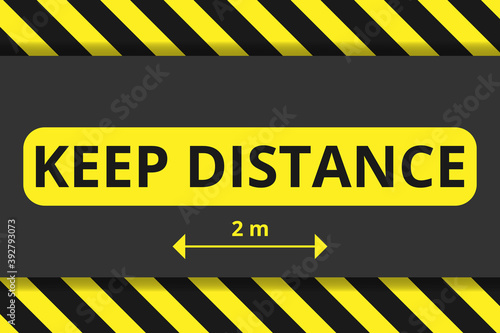 Sign of social distance on a background of black and yellow stripes. The distance is 2 meters.