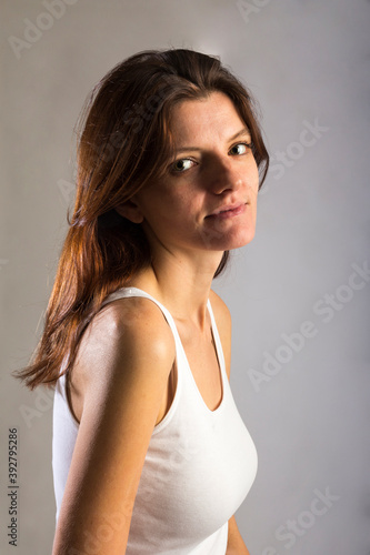 Portrait of beautiful young woman in white t-shirt