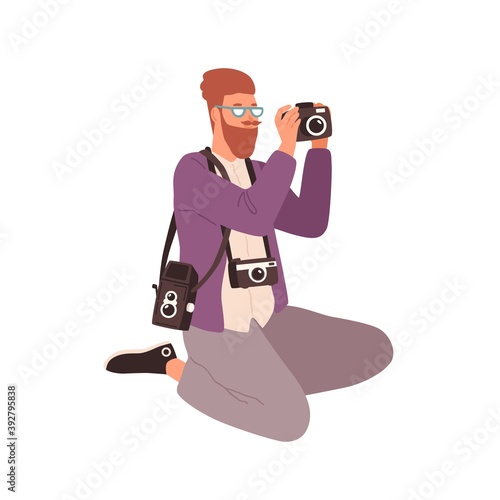 Young male photographer with TLR, digital and 35 mm cameras. Portrait of creative photojournalist with modern and retro photo equipment isolated on white. Vector illustration in flat cartoon style
