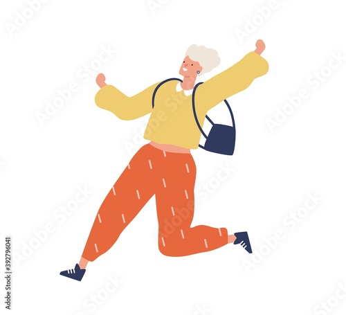 Blonde young woman in trendy clothes running fast. Enthusiastic modern female...