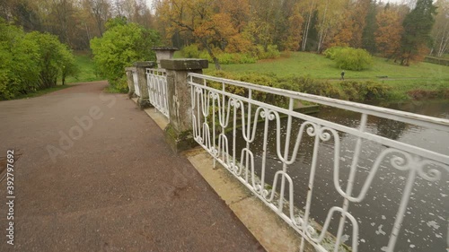Pavlovsk park in autumn, St. Petersburg, Visconti bridge spanning the Slavianka river photo