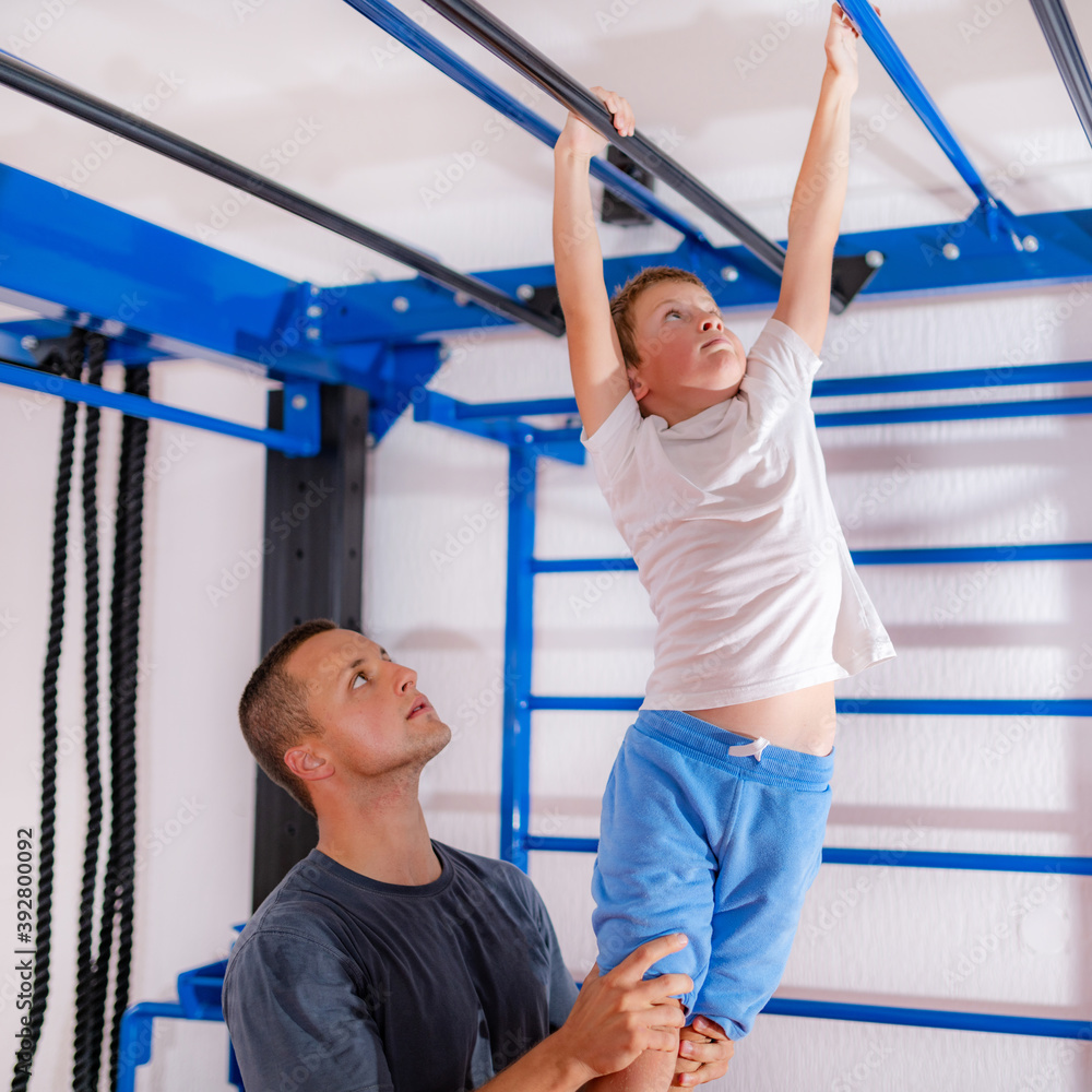 Fototapeta premium Physical activity for children, monkey bar exercise