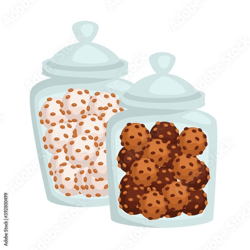 Jars with cookies or candies of chocolate or glaze confectionery products