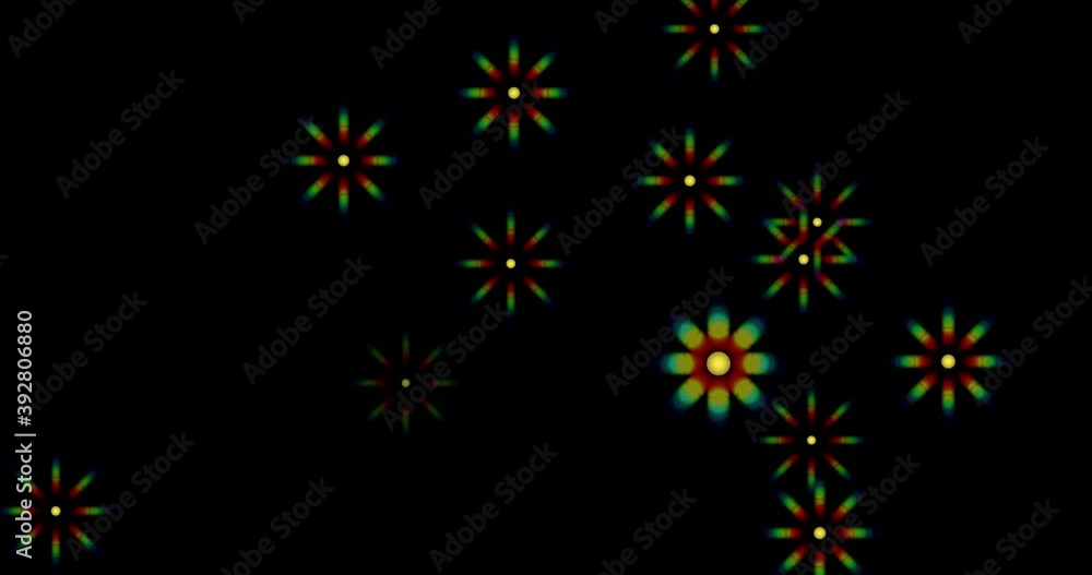 Stars of iridescent shades in the form of flowers fly towards the viewer Stars of iridescent shades in the form of flowers fly towards the viewer