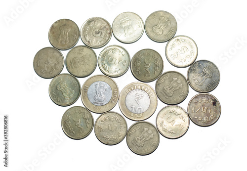 Stock pile of Indian 5  10 rupee metal coin currency isolated on white background. Financial  economy  Banking and exchange investment concept. 5  10 rupee coin highlighted.