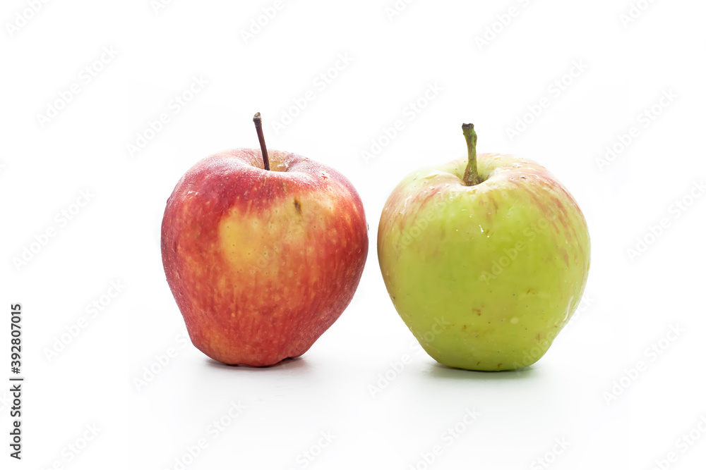 Green and red apple on white background