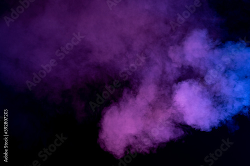 Abstract smoke over the black background. Smoke background. Smoke movement on black background