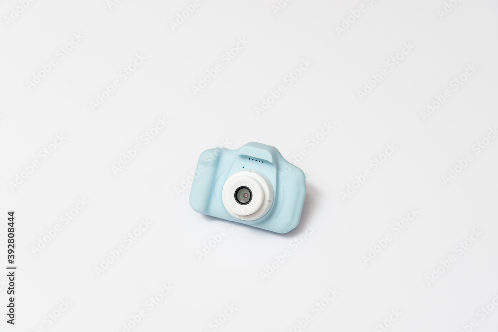 little blue photo camera for kids on white background. little blue photo camera for kids on white background.
