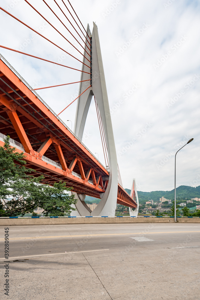 Fototapeta premium Empty road and Dongshuimen bridge in Chongqing, China