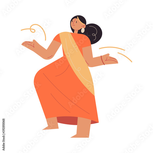 Indian woman wearing orange bright traditional beautiful sari dress