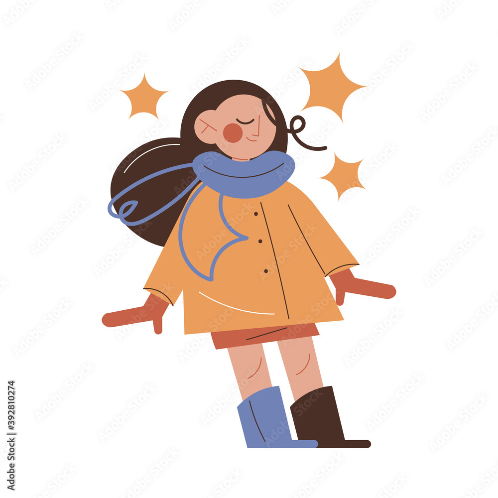 Girl wearing warm jacket, mittens and boots for walks and playing outdoors