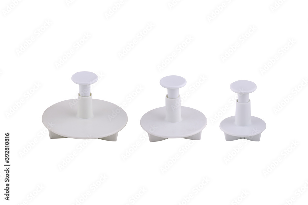 Plastic cutter for mastic isolated on white background. Mold, bakeware. Top view, flat lay Plastic cutter for mastic isolated on white background. Mold, bakeware. Top view, flat lay