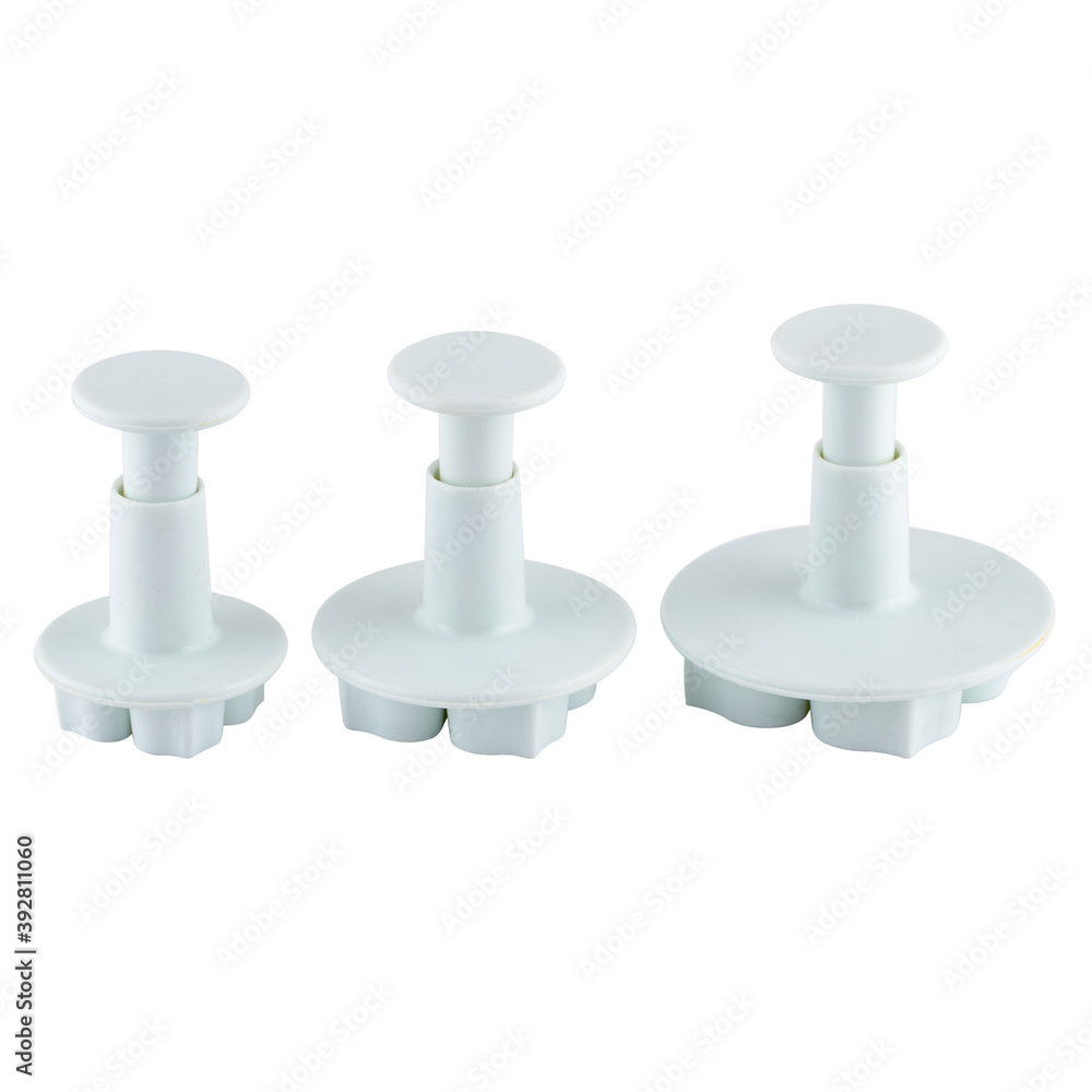 Plastic cutter for mastic isolated on white background. Mold, bakeware. Top view, flat lay Plastic cutter for mastic isolated on white background. Mold, bakeware. Top view, flat lay