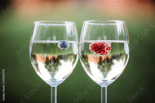 two glasses of wine with fruits