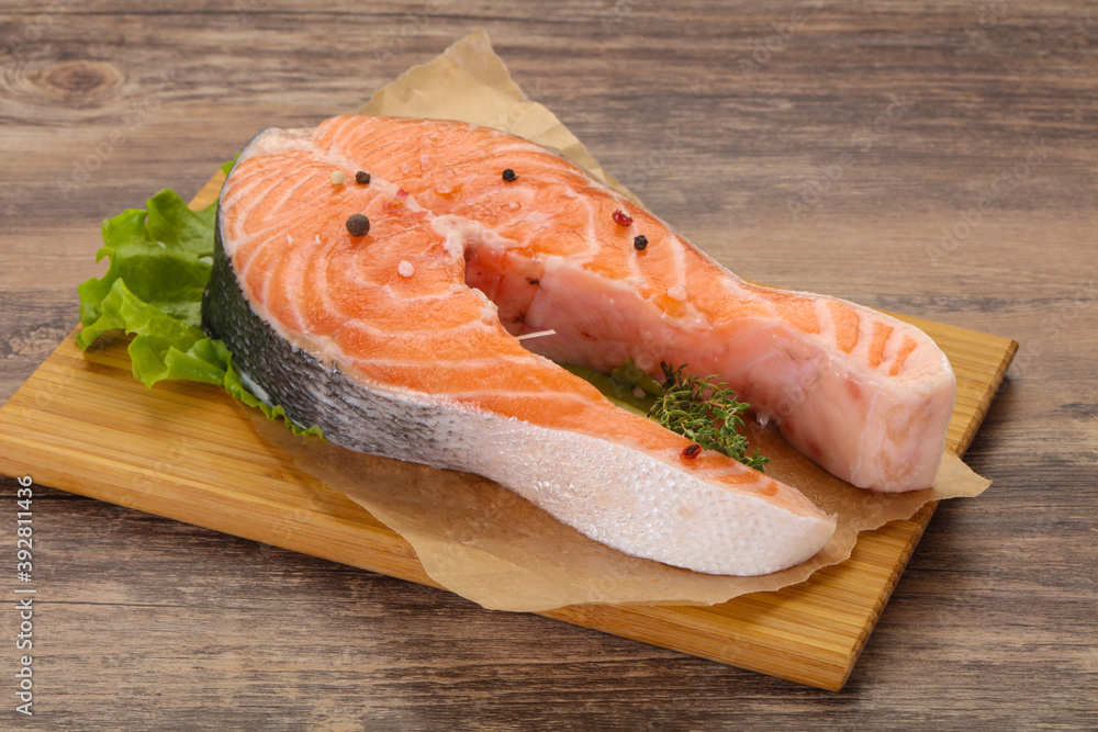 Raw salmon steak - ready for grill Raw salmon steak - ready for grill