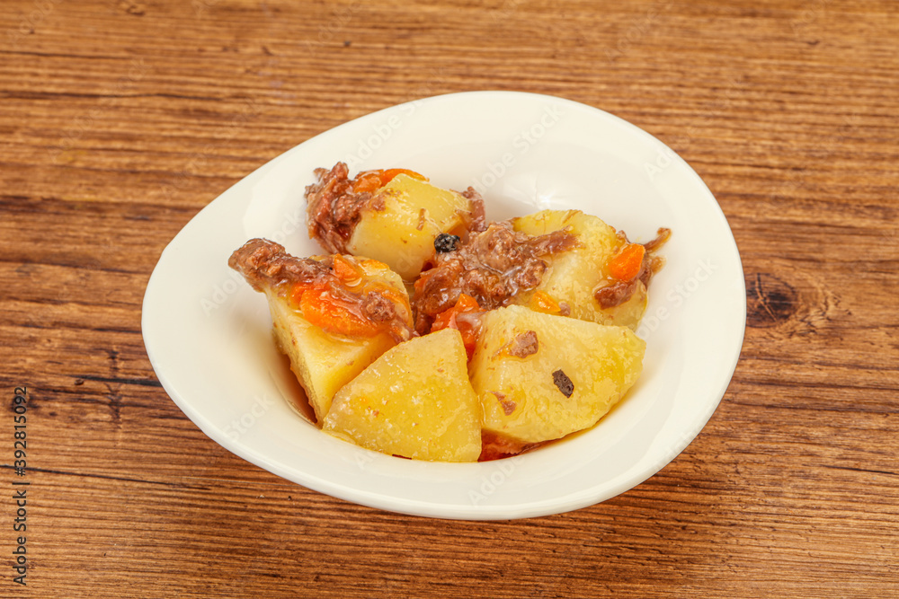 Roasted potato and beef with sauce Roasted potato and beef with sauce