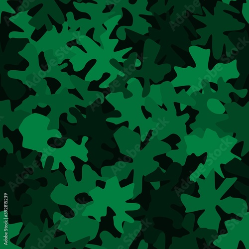 Green camouflage pattern background seamless vector illustration