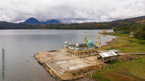 Mosque and lake Lanao surrounded by mountains. Mindanao, Lanao del Sur, Philippines. photo