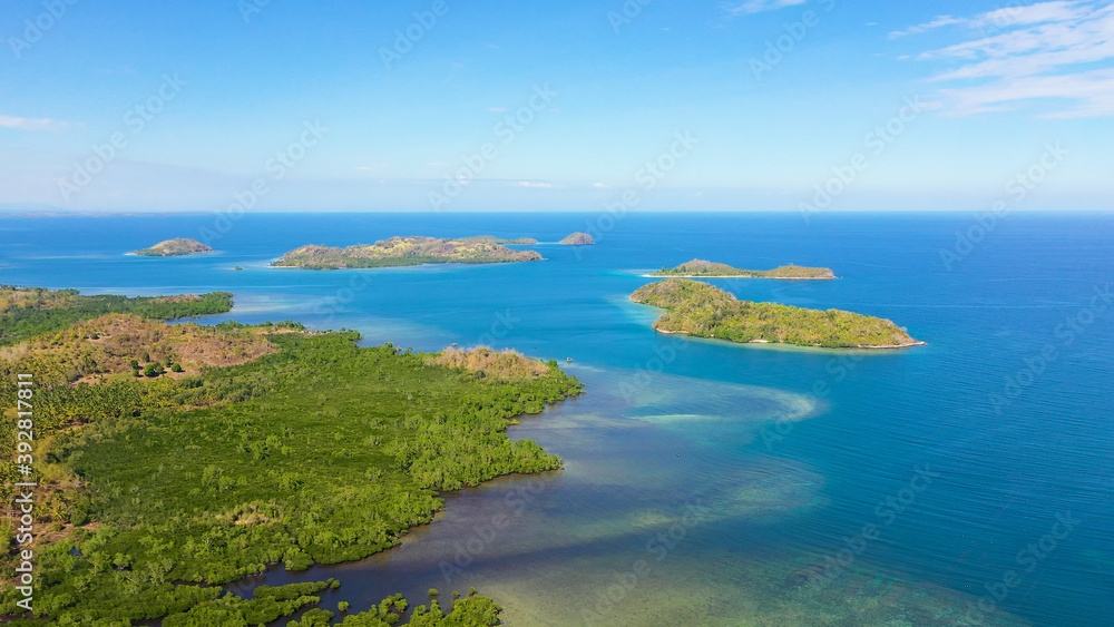 Islands with a sandy beaches and azure water. Lambang Island, Buguias Island. Zamboanga, Mindanao, Philippines.
