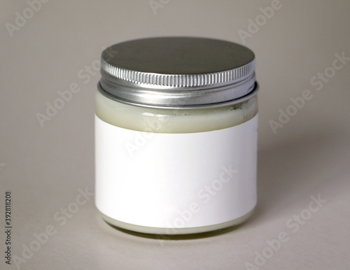 Glass jar packaging with metal lid and white label