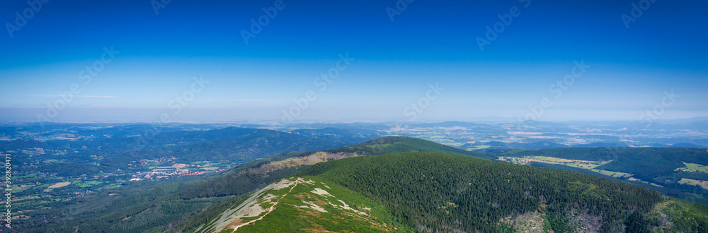 Mountain scenery of the Karkonosze Mountains from the top of Sniezka peak, Poland
