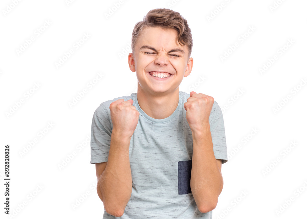Happy boy showing victory sign isolated on white background Happy boy showing victory sign isolated on white background