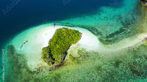 Aerial drone of Seascape with beautiful beach. Britania Islands, Surigao del Sur, Philippines.