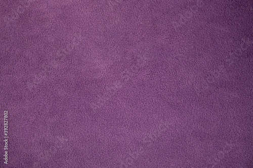 Fleece, polar or Blanket purple color fabric texture background.
