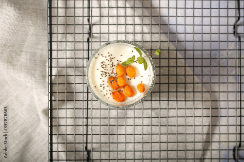 homemade yogurt with sea buckthorn and Chia seeds is on the table