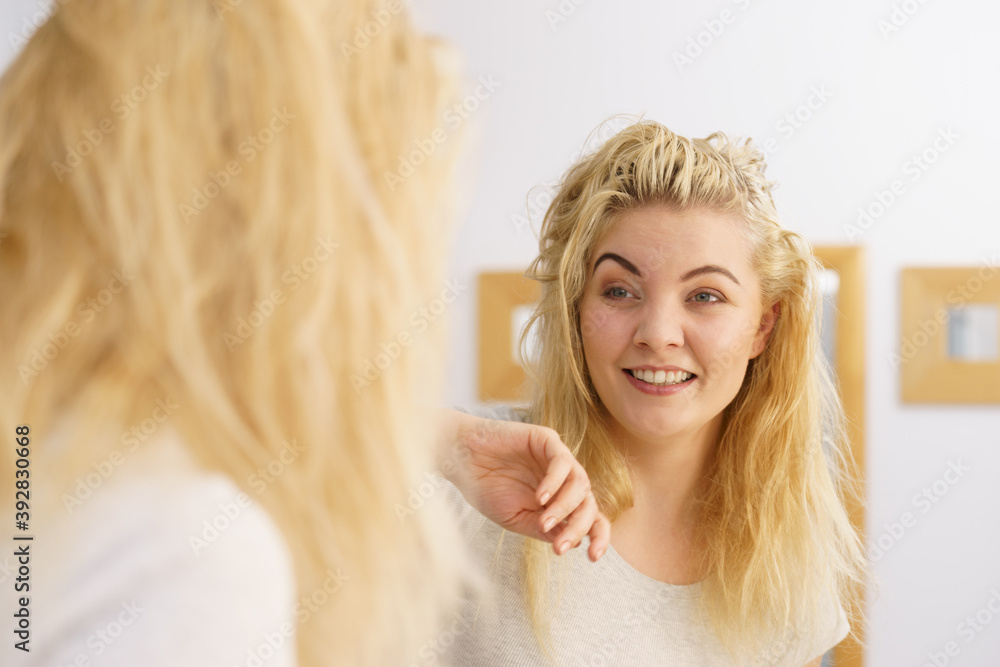 Happy fresh blonde woman in bathroom Happy fresh blonde woman in bathroom