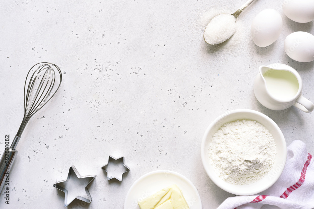 Bakiing background with ingredients for making cake or biscuit. Top view with copy space. Bakiing background with ingredients for making cake or biscuit. Top view with copy space.