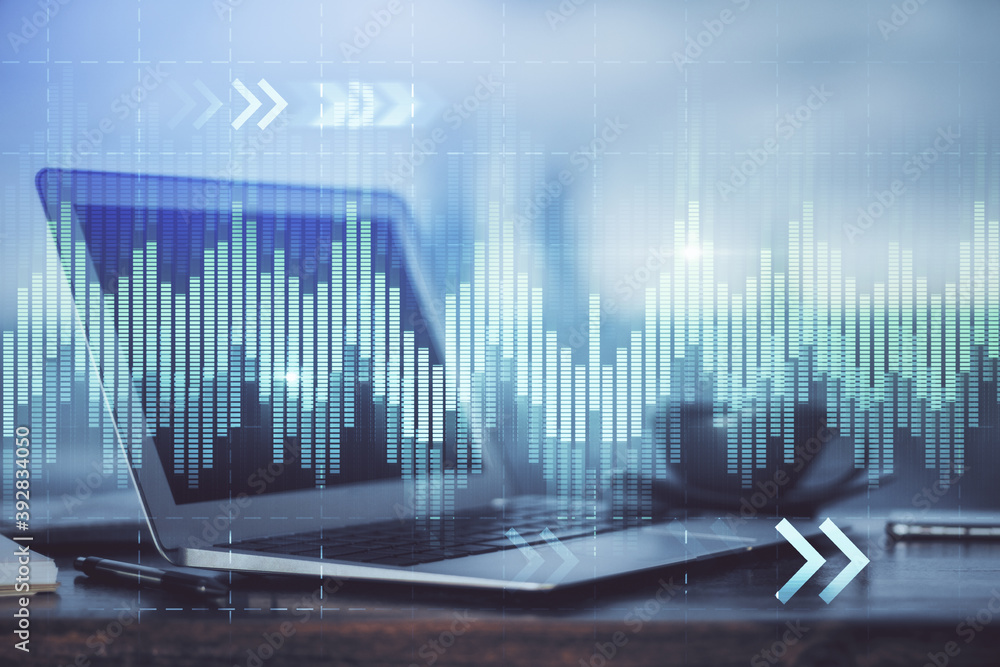 Forex market chart hologram and personal computer background. Double exposure. Concept of investment. Forex market chart hologram and personal computer background. Double exposure. Concept of investment.