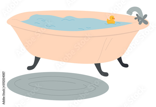 Bathtub full of water, rubber yellow toy duck, bath in the bathroom, oval gray fleecy rug on the floor. Relaxing, washing, bodycare, home spa treatments. Vector cartoon flat image of bathroom element