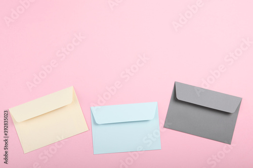 Paper color envelope for letters on a colored background in the air © White bear studio 