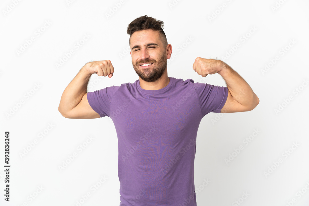 Caucasian man isolated on white background doing strong gesture Caucasian man isolated on white background doing strong gesture