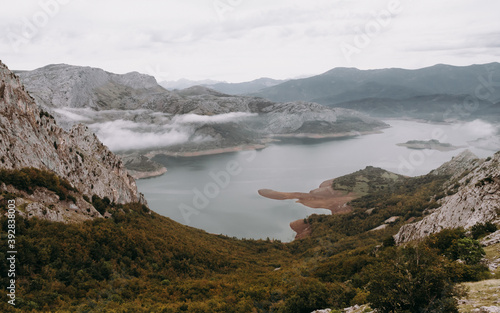 Scenic view of lake surrounded by mountains