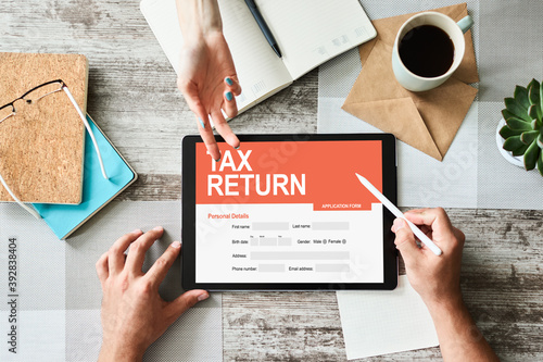 Online tax return application on screen. Business and finance concept.