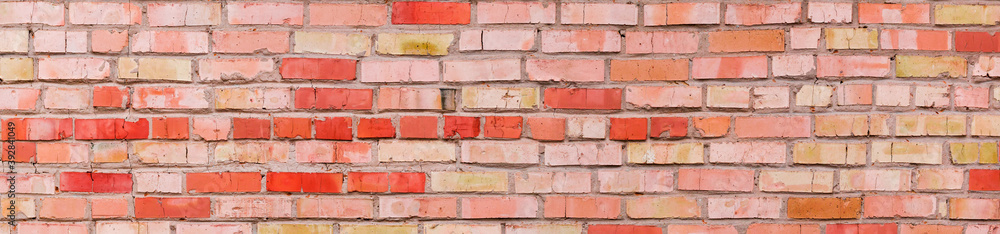 Old wall of cracked red and yellow bricks, panorama Old wall of cracked red and yellow bricks, panorama