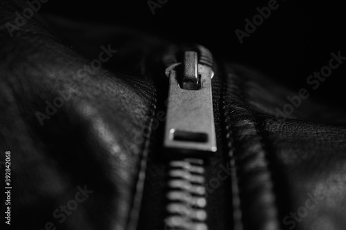 Black leather jacket and its metallic details