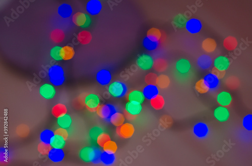Christmas lights glowing garlands, background and texture of lights
