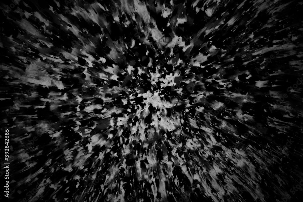 Obraz premium Abstract black-white background of molten plastic. Blurred